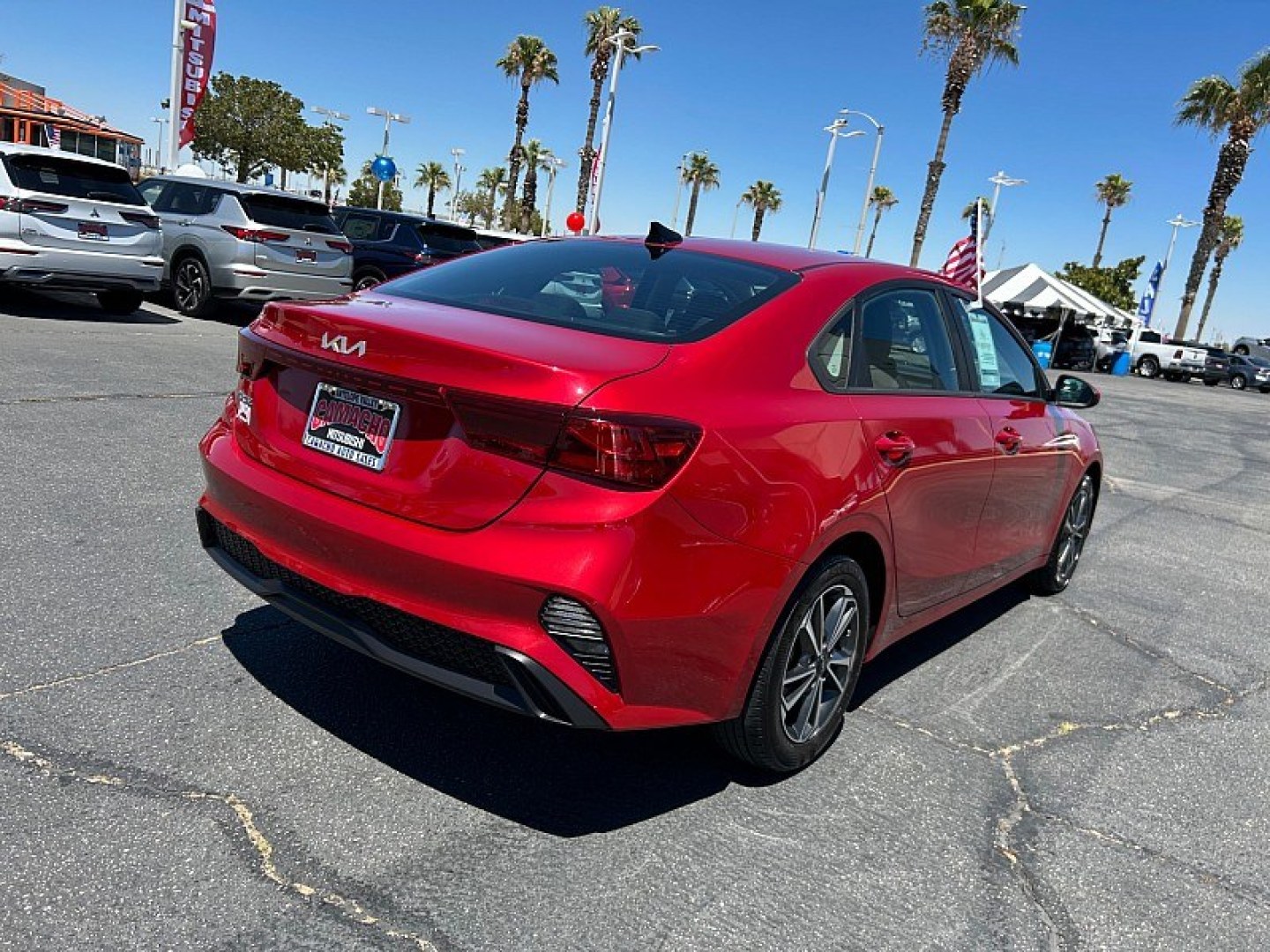 2023 Red Kia Forte (3KPF24AD6PE) with an 4-Cyl 2.0 Liter engine, Automatic IVT transmission, located at 412 Auto Vista Drive, Palmdale, 93551, (661) 945-0620, 34.592636, -118.136681- Photo#2