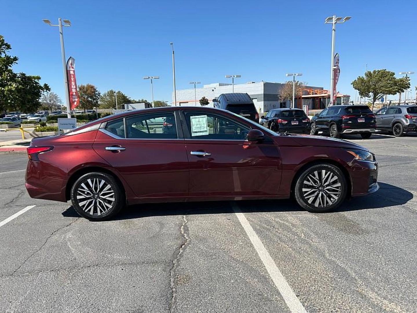2023 RED Nissan Altima (1N4BL4DV5PN) with an 4-Cyl 2.5 Liter engine, Automatic Xtronic CVT transmission, located at 412 Auto Vista Drive, Palmdale, 93551, (661) 945-0620, 34.592636, -118.136681 - Photo#3