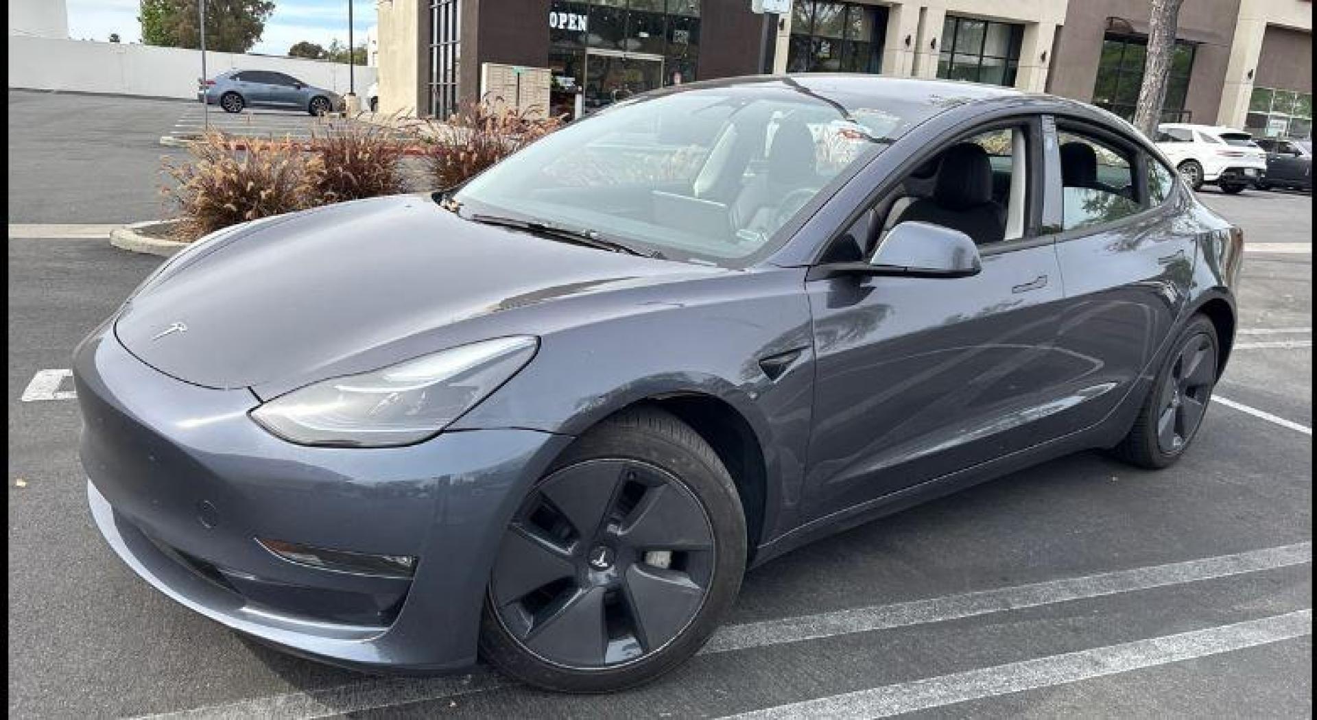 2023 GRAY Tesla Model 3 (5YJ3E1EA2PF) with an AC Electric Motor engine, Single-Speed Fixed Gear transmission, located at 412 Auto Vista Drive, Palmdale, 93551, (661) 945-0620, 34.592636, -118.136681- Photo#3