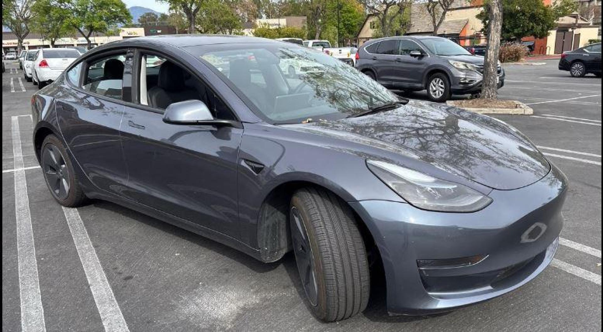 2023 GRAY Tesla Model 3 (5YJ3E1EA2PF) with an AC Electric Motor engine, Single-Speed Fixed Gear transmission, located at 412 Auto Vista Drive, Palmdale, 93551, (661) 945-0620, 34.592636, -118.136681- Photo#1