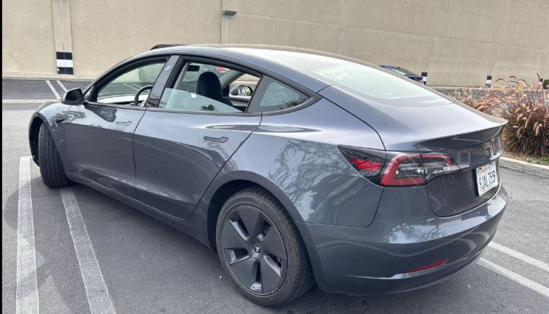 2023 GRAY Tesla Model 3 (5YJ3E1EA2PF) with an AC Electric Motor engine, Single-Speed Fixed Gear transmission, located at 412 Auto Vista Drive, Palmdale, 93551, (661) 945-0620, 34.592636, -118.136681- Photo#2