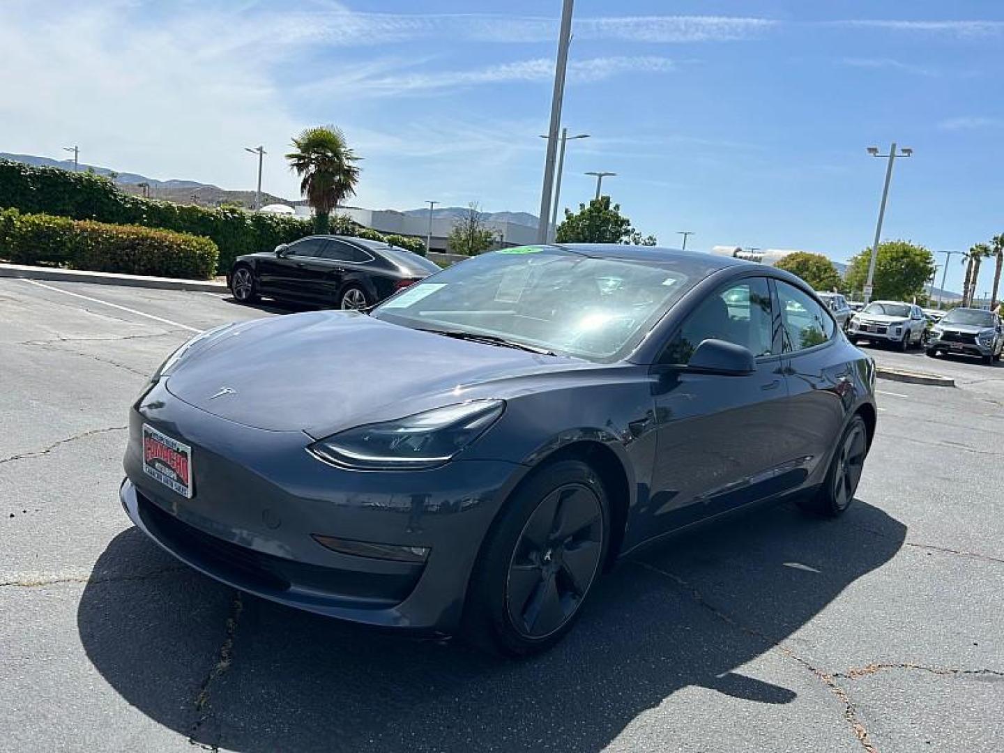 2023 GRAY Tesla Model 3 (5YJ3E1EA2PF) with an AC Electric Motor engine, Single-Speed Fixed Gear transmission, located at 412 Auto Vista Drive, Palmdale, 93551, (661) 945-0620, 34.592636, -118.136681- Photo#4