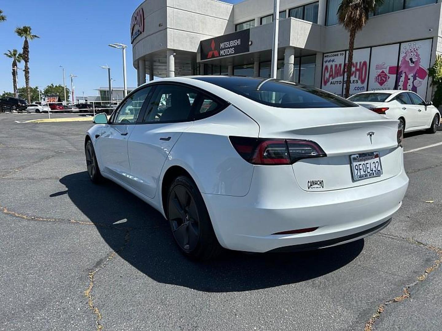 2023 WHITE Tesla Model 3 (5YJ3E1EA5PF) with an AC Electric Motor engine, Single-Speed Fixed Gear transmission, located at 412 Auto Vista Drive, Palmdale, 93551, (661) 945-0620, 34.592636, -118.136681 - Photo#4