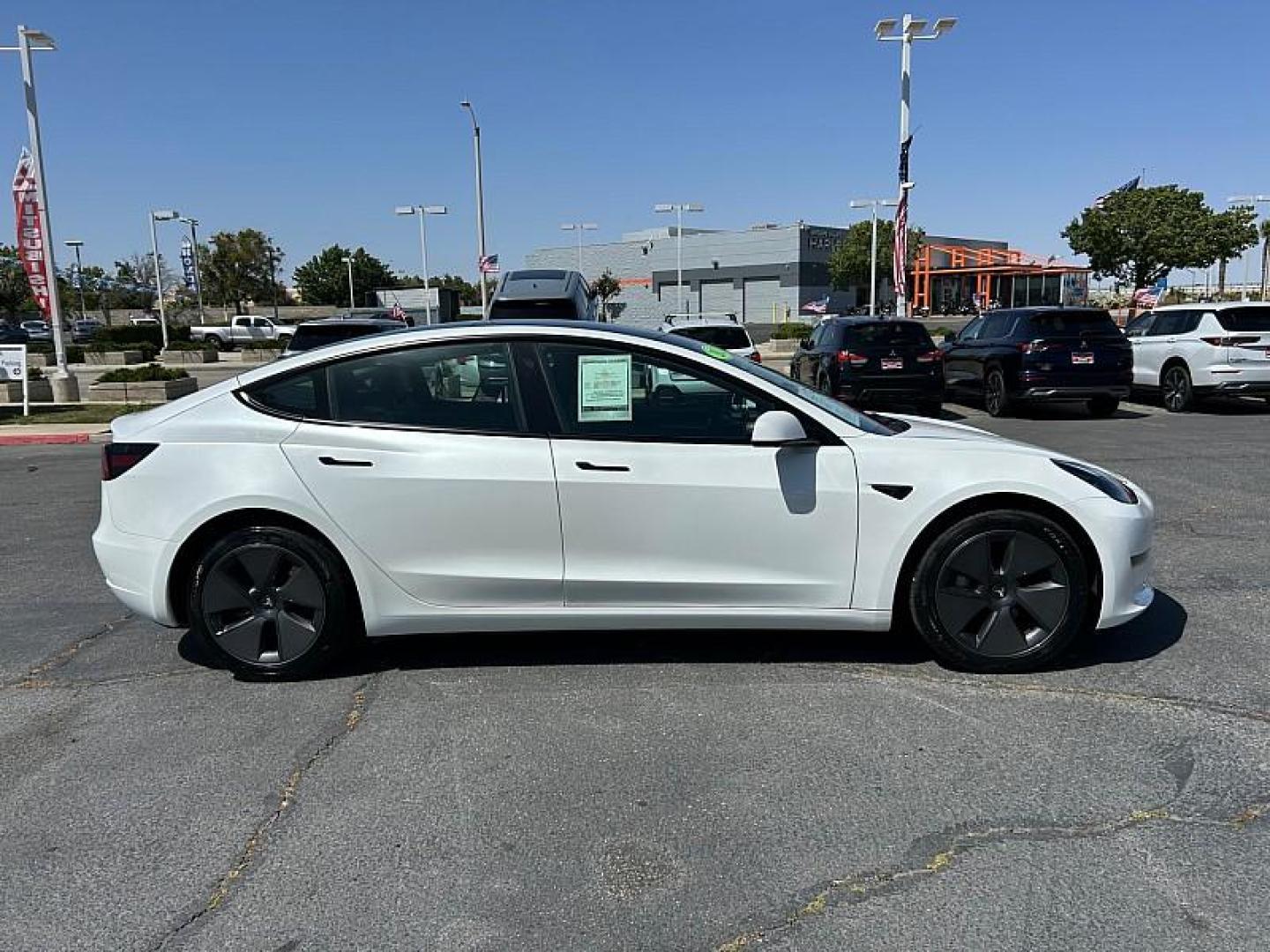 2023 WHITE Tesla Model 3 (5YJ3E1EA5PF) with an AC Electric Motor engine, Single-Speed Fixed Gear transmission, located at 412 Auto Vista Drive, Palmdale, 93551, (661) 945-0620, 34.592636, -118.136681 - Photo#7