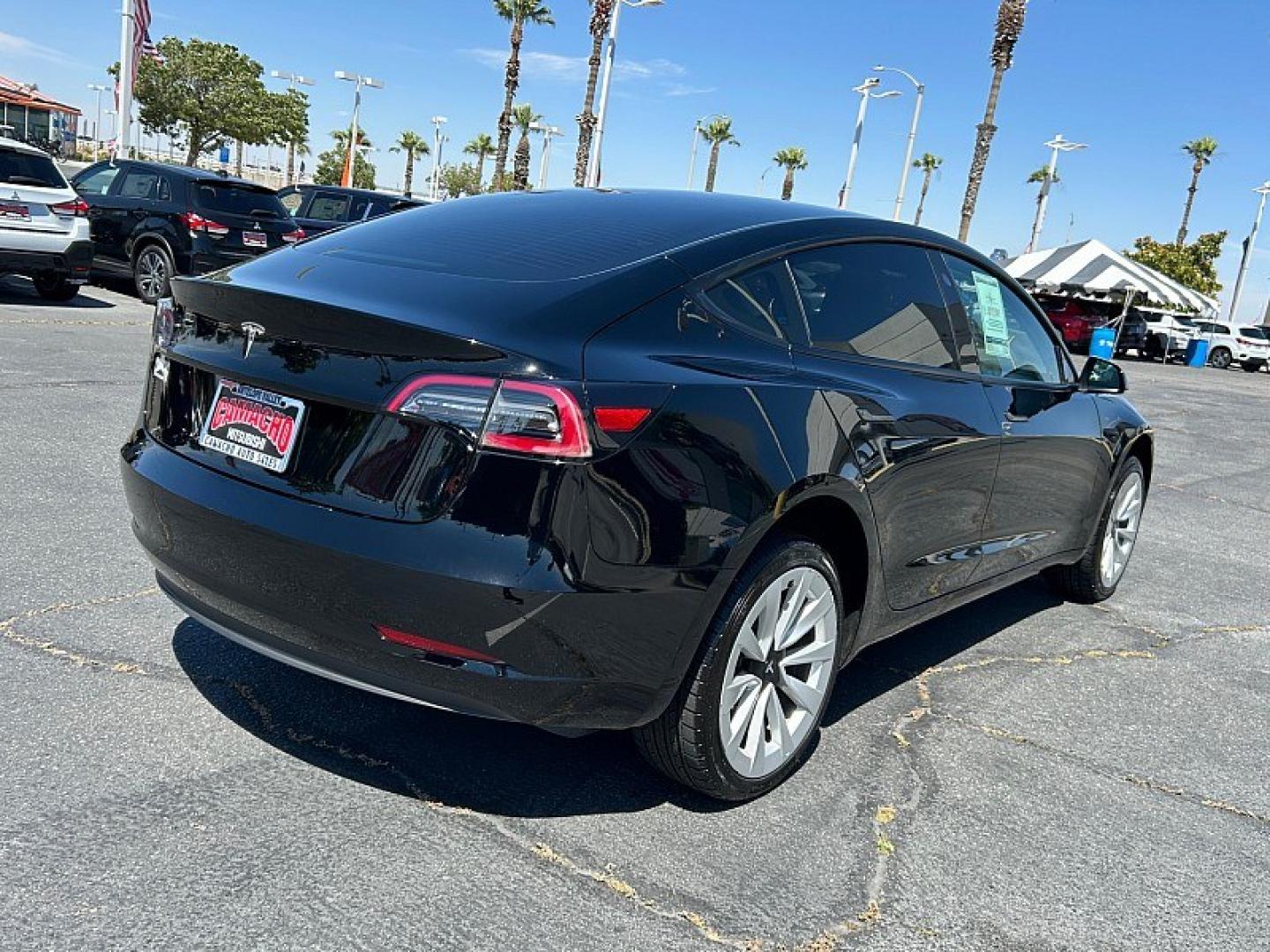 2023 BLACK Tesla Model 3 (5YJ3E1EA6PF) with an AC Electric Motor engine, Single-Speed Fixed Gear transmission, located at 412 Auto Vista Drive, Palmdale, 93551, (661) 945-0620, 34.592636, -118.136681 - Photo#2