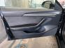 2023 BLACK Tesla Model 3 (5YJ3E1EA6PF) with an AC Electric Motor engine, Single-Speed Fixed Gear transmission, located at 412 Auto Vista Drive, Palmdale, 93551, (661) 945-0620, 34.592636, -118.136681 - Photo#17