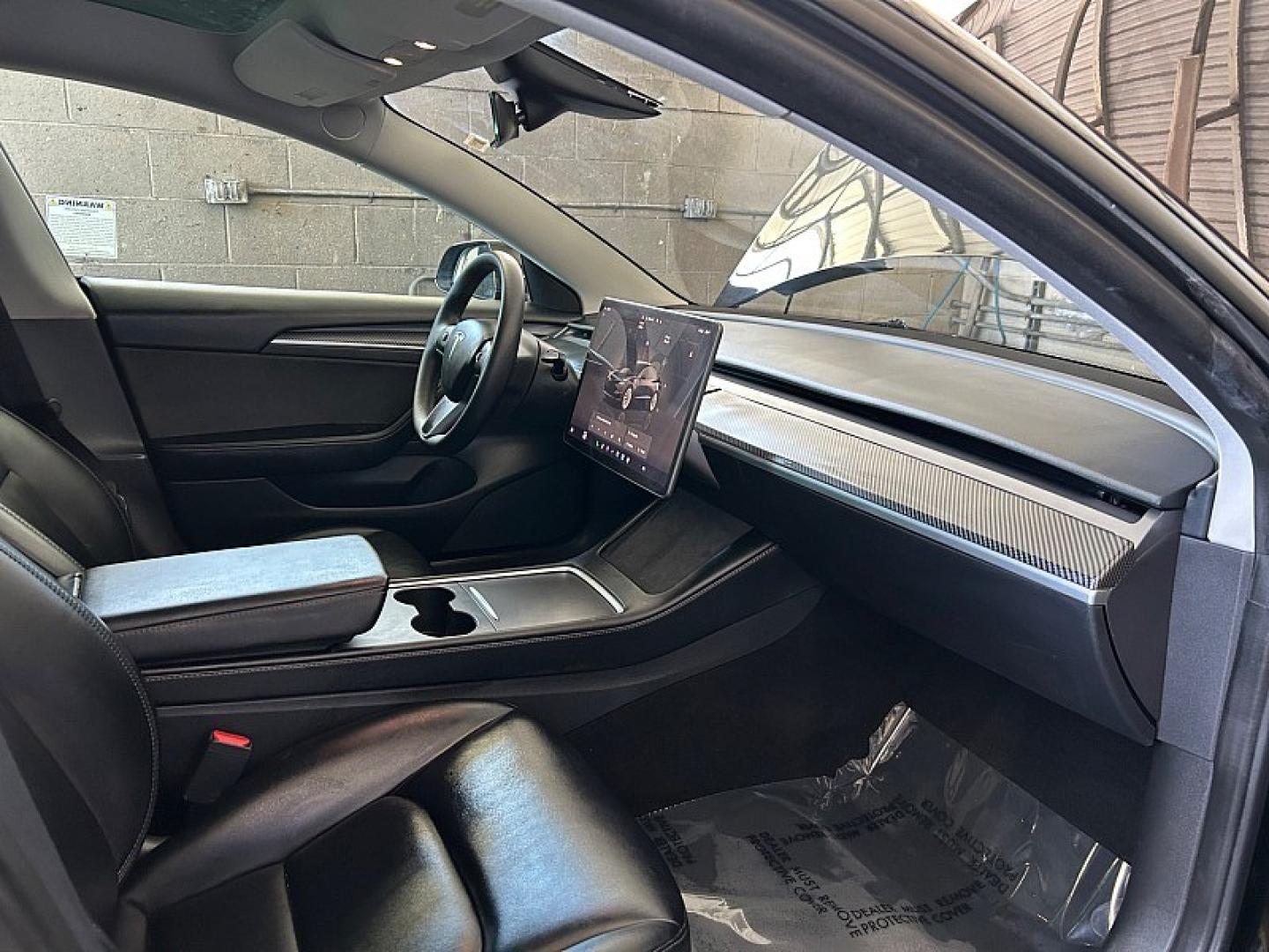 2023 BLACK Tesla Model 3 (5YJ3E1EA6PF) with an AC Electric Motor engine, Single-Speed Fixed Gear transmission, located at 412 Auto Vista Drive, Palmdale, 93551, (661) 945-0620, 34.592636, -118.136681 - Photo#27