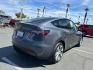 2023 GRAY Tesla Model Y (7SAYGDEE0PA) with an Dual AC Electric Motors engine, Single-Speed Fixed Gear transmission, located at 412 Auto Vista Drive, Palmdale, 93551, (661) 945-0620, 34.592636, -118.136681 - Photo#2