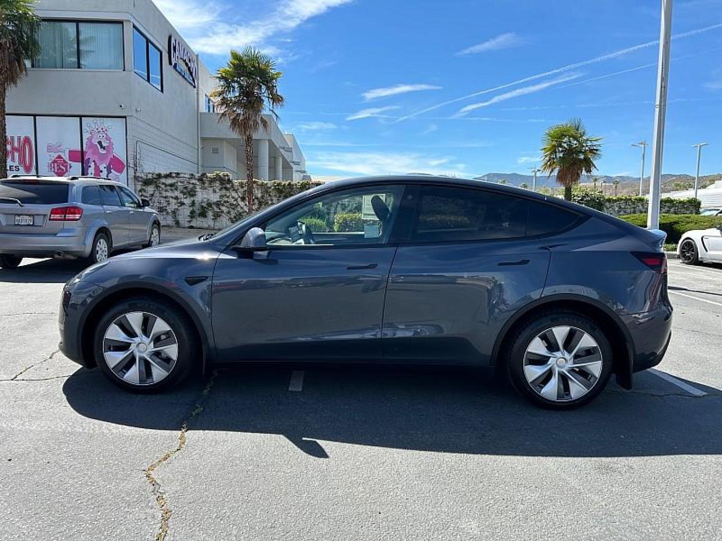 2023 GRAY Tesla Model Y (7SAYGDEE0PA) with an Dual AC Electric Motors engine, Single-Speed Fixed Gear transmission, located at 412 Auto Vista Drive, Palmdale, 93551, (661) 945-0620, 34.592636, -118.136681 - Photo#5
