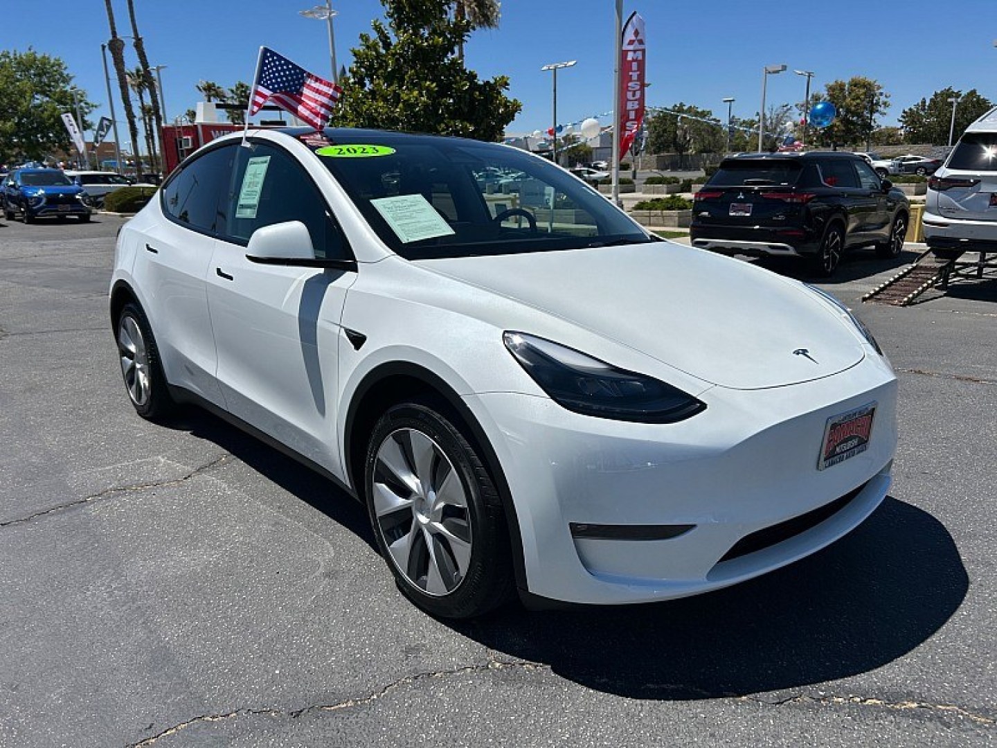 2023 White Tesla Model Y (7SAYGDEE2PF) with an Dual AC Electric Motors engine, Single-Speed Fixed Gear transmission, located at 412 Auto Vista Drive, Palmdale, 93551, (661) 945-0620, 34.592636, -118.136681- Photo#0