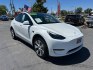 2023 White Tesla Model Y (7SAYGDEE2PF) with an Dual AC Electric Motors engine, Single-Speed Fixed Gear transmission, located at 412 Auto Vista Drive, Palmdale, 93551, (661) 945-0620, 34.592636, -118.136681- Photo#0