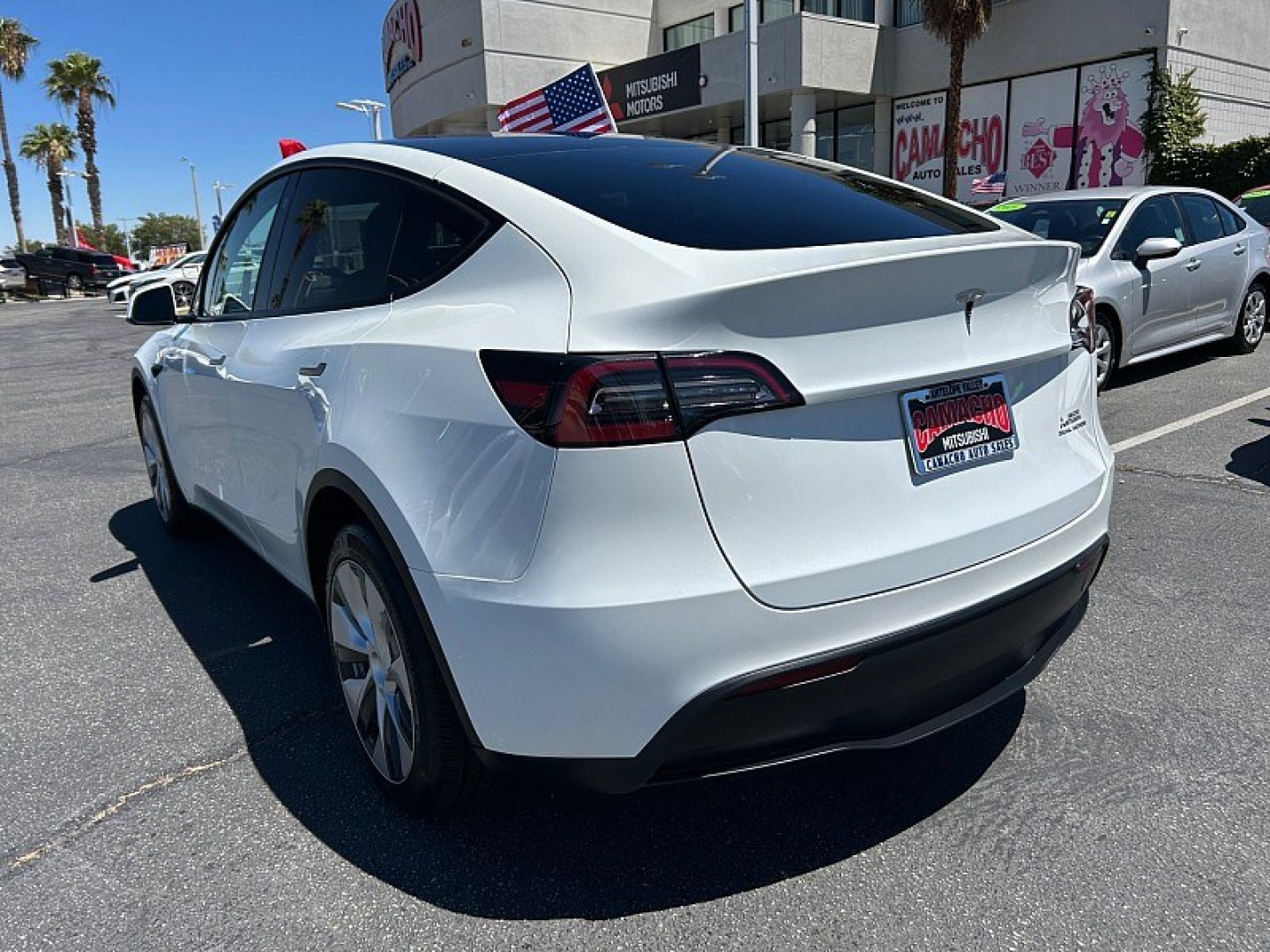 2023 White Tesla Model Y (7SAYGDEE2PF) with an Dual AC Electric Motors engine, Single-Speed Fixed Gear transmission, located at 412 Auto Vista Drive, Palmdale, 93551, (661) 945-0620, 34.592636, -118.136681- Photo#4