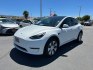 2023 White Tesla Model Y (7SAYGDEE2PF) with an Dual AC Electric Motors engine, Single-Speed Fixed Gear transmission, located at 412 Auto Vista Drive, Palmdale, 93551, (661) 945-0620, 34.592636, -118.136681- Photo#6
