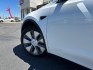 2023 White Tesla Model Y (7SAYGDEE2PF) with an Dual AC Electric Motors engine, Single-Speed Fixed Gear transmission, located at 412 Auto Vista Drive, Palmdale, 93551, (661) 945-0620, 34.592636, -118.136681- Photo#7