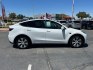 2023 White Tesla Model Y (7SAYGDEE2PF) with an Dual AC Electric Motors engine, Single-Speed Fixed Gear transmission, located at 412 Auto Vista Drive, Palmdale, 93551, (661) 945-0620, 34.592636, -118.136681- Photo#10