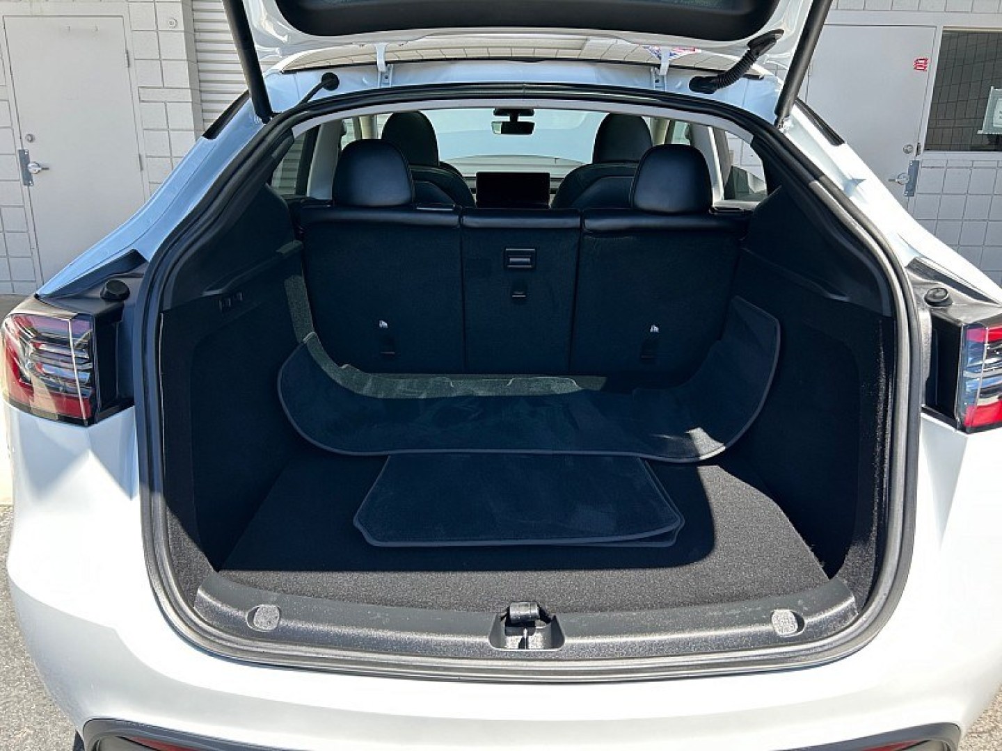 2023 White Tesla Model Y (7SAYGDEE2PF) with an Dual AC Electric Motors engine, Single-Speed Fixed Gear transmission, located at 412 Auto Vista Drive, Palmdale, 93551, (661) 945-0620, 34.592636, -118.136681- Photo#29