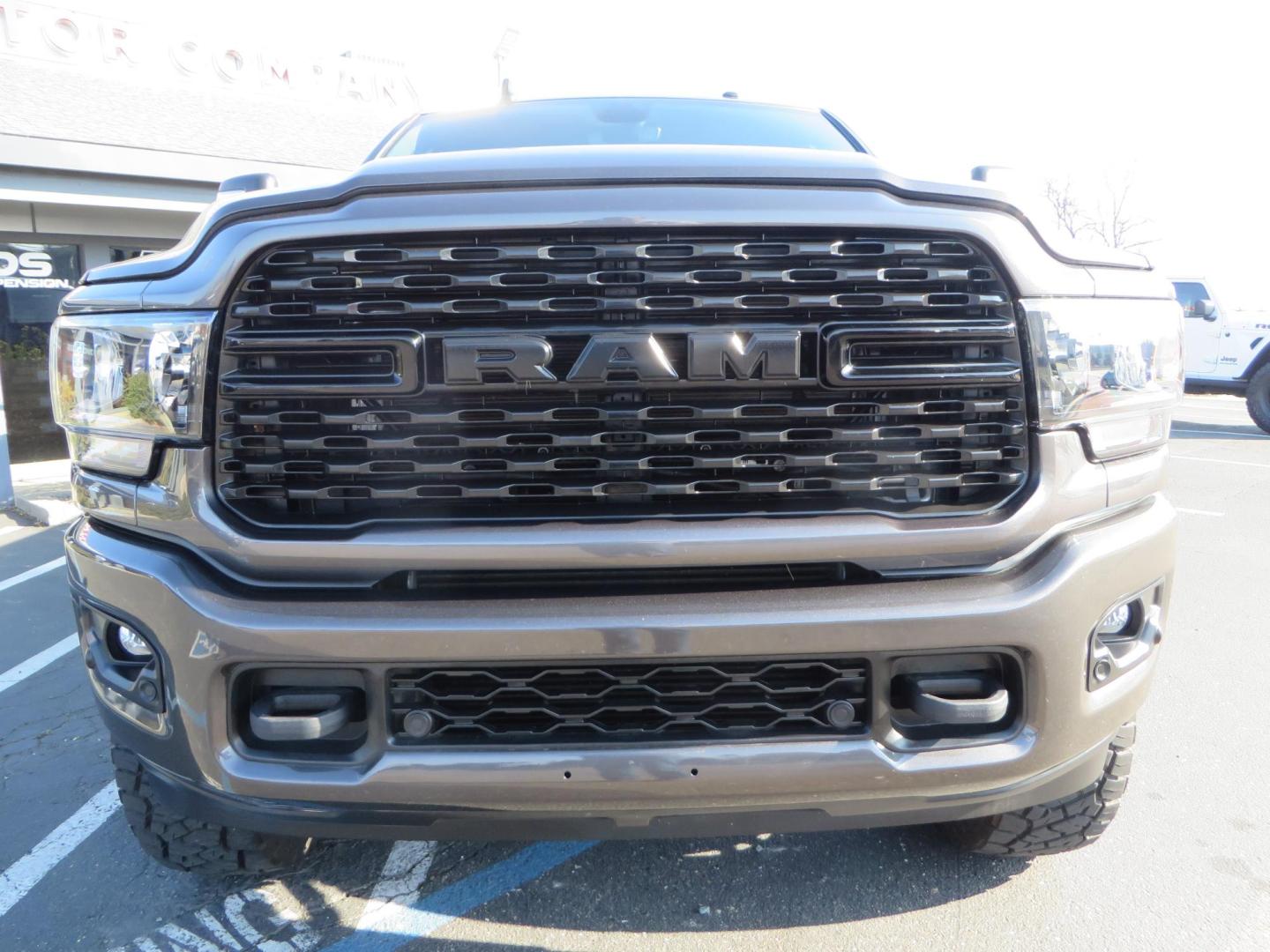 2024 CHARCOAL /BLACK RAM 2500 Big Horn Crew Cab SWB 4WD (3C6UR5DL7RG) with an 6.7L L6 OHV 24V TURBO DIESEL engine, 6A transmission, located at 2630 Grass Valley Highway, Auburn, CA, 95603, (530) 508-5100, 38.937893, -121.095482 - Leveled Ram sitting on 37" Toyo RT trail tires, 17" Method MR318 wheels, Fox 2.5 remote reservoir shock up front, Amp Power steps, and window tint. - Photo#12