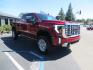 2024 Volcanic Red /Black GMC Sierra 2500HD Denali Crew Cab 4WD SB (1GT49REY6RF) with an 6.6L V8 OHV 16V TURBO DIESEL engine, 6A transmission, located at 2630 Grass Valley Highway, Auburn, CA, 95603, (530) 508-5100, 38.937893, -121.095482 - Denali 2500 featuring a Cognito Level kit, Fox shocks, 20" Fittipaldi FA18 wheels, 35" Nitto Ridge Grappler tires, and a LineX folding tonneau cover. - Photo#2