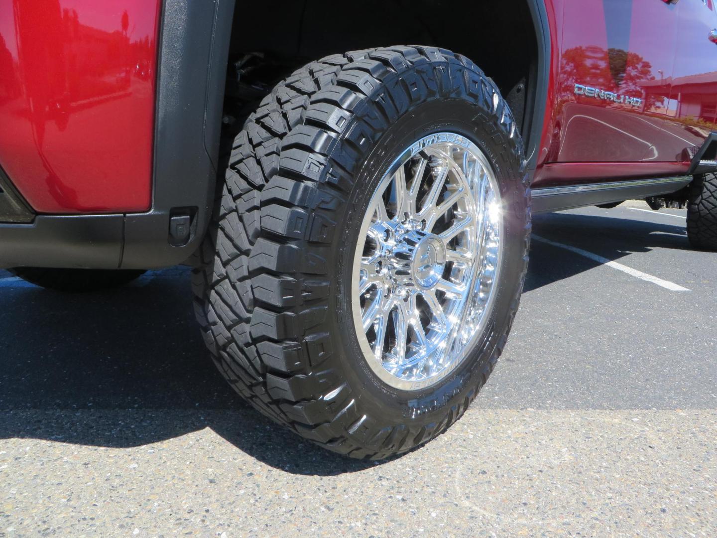 2024 Volcanic Red /Black GMC Sierra 2500HD Denali Crew Cab 4WD SB (1GT49REY6RF) with an 6.6L V8 OHV 16V TURBO DIESEL engine, 6A transmission, located at 2630 Grass Valley Highway, Auburn, CA, 95603, (530) 508-5100, 38.937893, -121.095482 - Denali 2500 featuring a Cognito Level kit, Fox shocks, 20" Fittipaldi FA18 wheels, 35" Nitto Ridge Grappler tires, and a LineX folding tonneau cover. - Photo#9