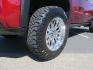 2024 Volcanic Red /Black GMC Sierra 2500HD Denali Crew Cab 4WD SB (1GT49REY6RF) with an 6.6L V8 OHV 16V TURBO DIESEL engine, 6A transmission, located at 2630 Grass Valley Highway, Auburn, CA, 95603, (530) 508-5100, 38.937893, -121.095482 - Denali 2500 featuring a Cognito Level kit, Fox shocks, 20" Fittipaldi FA18 wheels, 35" Nitto Ridge Grappler tires, and a LineX folding tonneau cover. - Photo#9