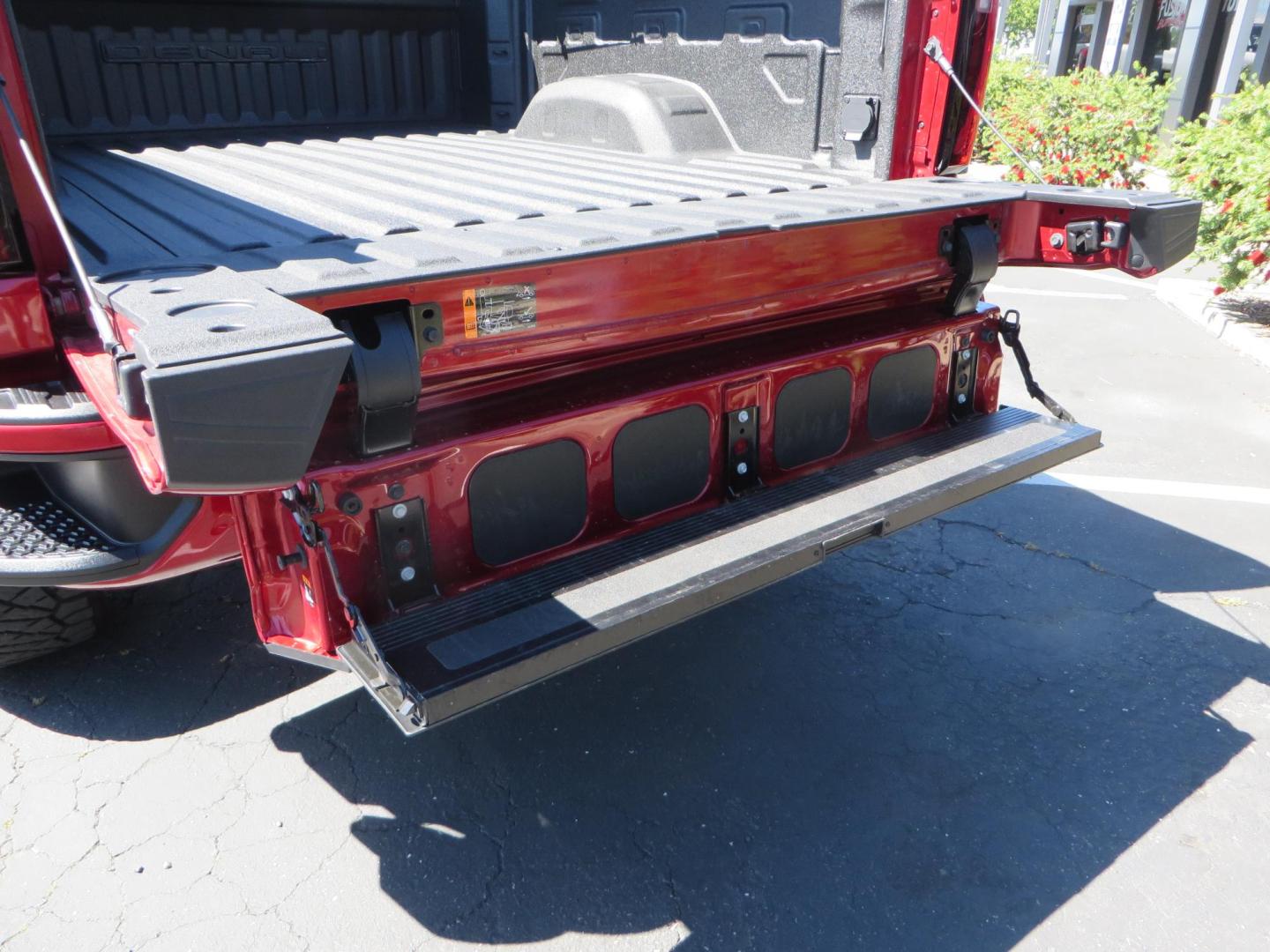 2024 Volcanic Red /Black GMC Sierra 2500HD Denali Crew Cab 4WD SB (1GT49REY6RF) with an 6.6L V8 OHV 16V TURBO DIESEL engine, 6A transmission, located at 2630 Grass Valley Highway, Auburn, CA, 95603, (530) 508-5100, 38.937893, -121.095482 - Denali 2500 featuring a Cognito Level kit, Fox shocks, 20" Fittipaldi FA18 wheels, 35" Nitto Ridge Grappler tires, and a LineX folding tonneau cover. - Photo#23