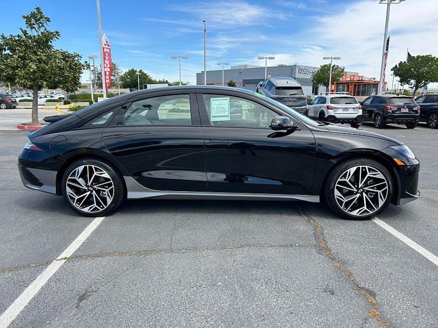 2024 BLACK Hyundai IONIQ 6 (KMHM54AA0RA) with an 225HP Electric Motor engine, Single-speed Reduction Gear transmission, located at 412 Auto Vista Drive, Palmdale, 93551, (661) 945-0620, 34.592636, -118.136681 - Photo#7