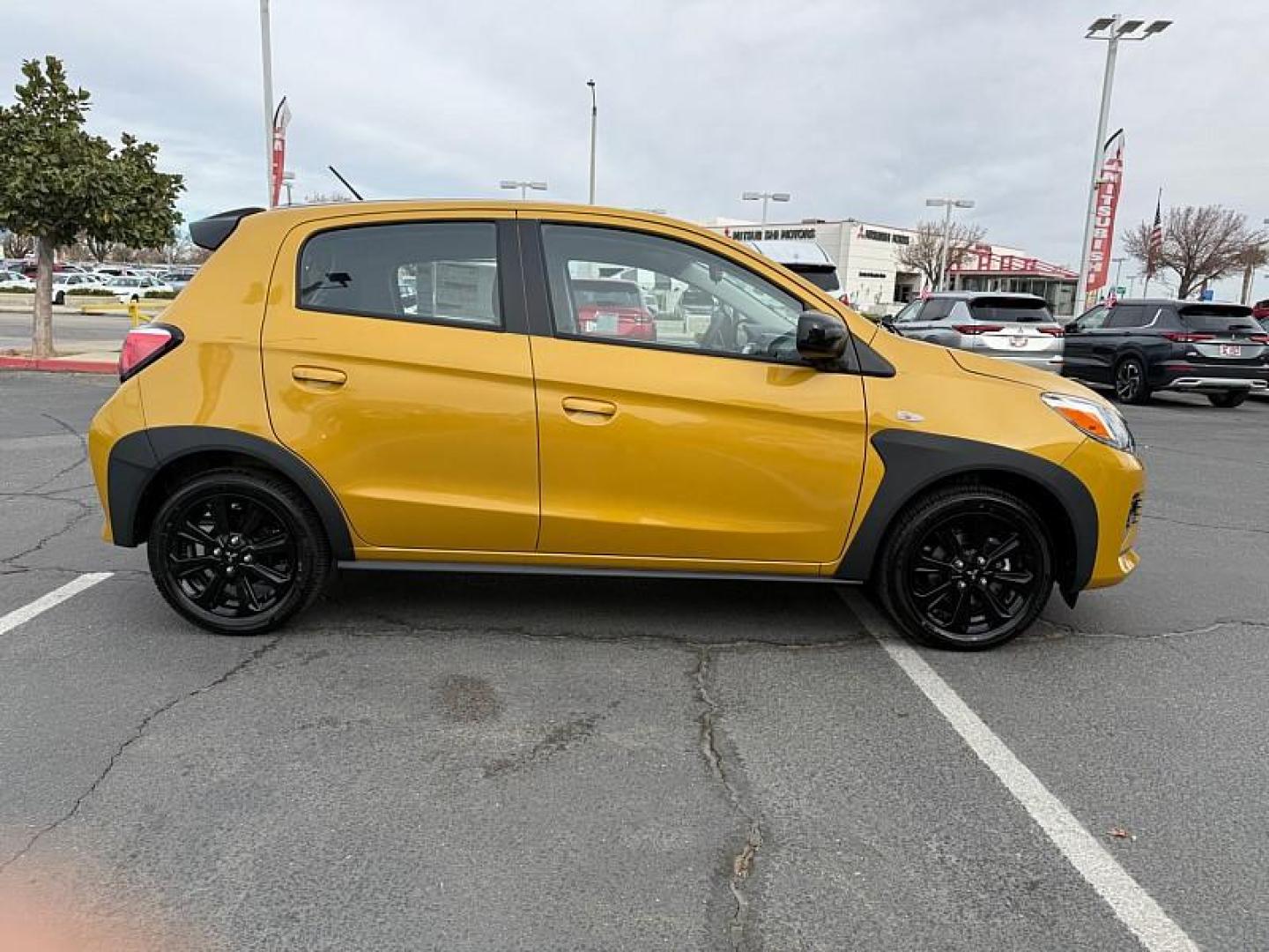 2024 YELLOW Mitsubishi Mirage (ML32AWHJ6RH) with an 3-Cyl 1.2 Liter engine, Automatic CVT transmission, located at 412 Auto Vista Drive, Palmdale, 93551, (661) 945-0620, 34.592636, -118.136681 - Photo#7