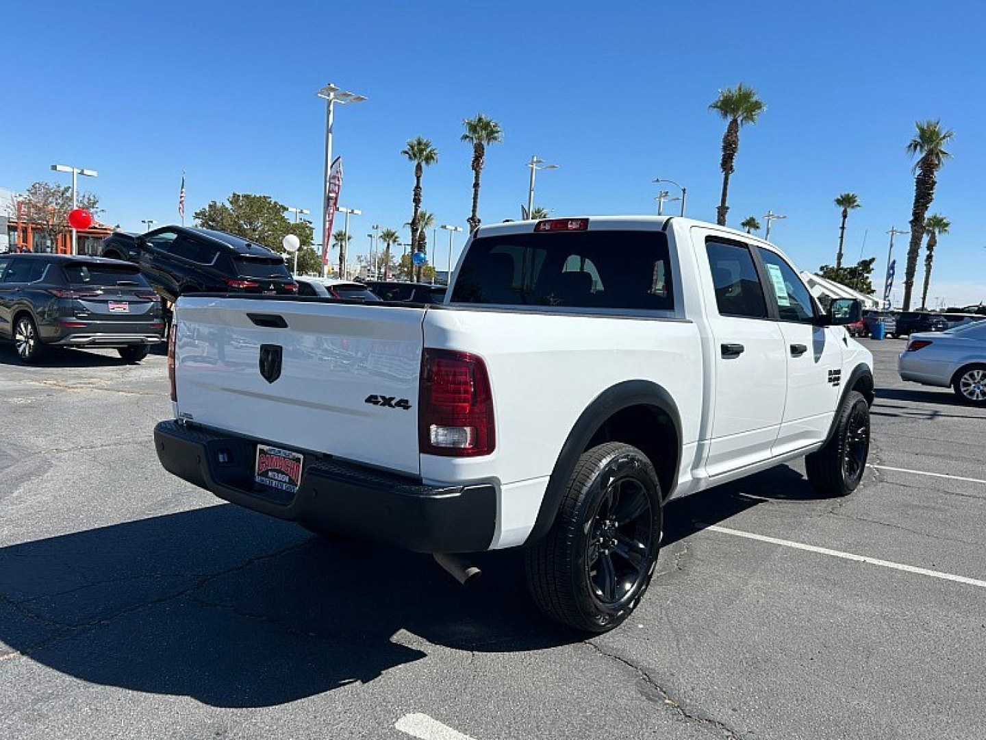 2024 White /Black Ram 1500 Classic 4WD (1C6RR7LG3RS) , Automatic 8-Spd transmission, located at 412 Auto Vista Drive, Palmdale, 93551, (661) 945-0620, 34.592636, -118.136681 - WARLOCK PACKAGE and bull; CREW CAB 4X4 and bull; 20-INCH BLACK WHEELS and bull; BACKUP CAMERAGet bold styling and everyday versatility in this 2024 Ram 1500 Classic Warlock Crew Cab 4x4 with 56,770 miles. Finished in Bright White Clearcoat with a black cloth interior, this truck stands out with 2- Photo#2