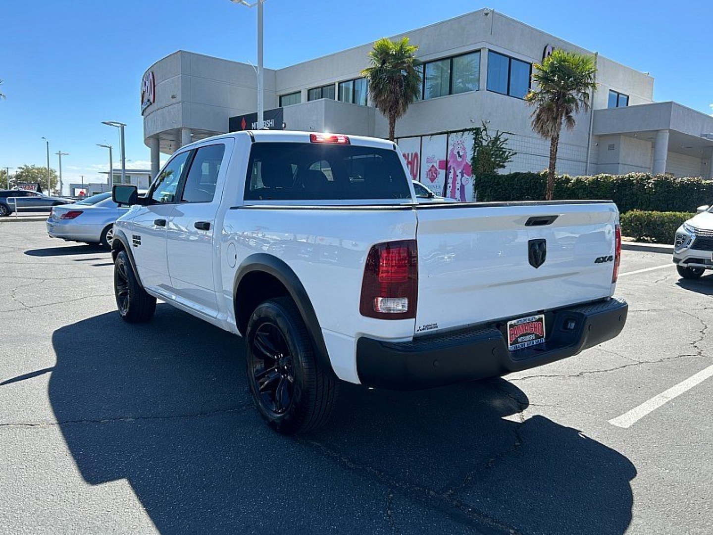 2024 White /Black Ram 1500 Classic 4WD (1C6RR7LG3RS) , Automatic 8-Spd transmission, located at 412 Auto Vista Drive, Palmdale, 93551, (661) 945-0620, 34.592636, -118.136681 - WARLOCK PACKAGE and bull; CREW CAB 4X4 and bull; 20-INCH BLACK WHEELS and bull; BACKUP CAMERAGet bold styling and everyday versatility in this 2024 Ram 1500 Classic Warlock Crew Cab 4x4 with 56,770 miles. Finished in Bright White Clearcoat with a black cloth interior, this truck stands out with 2- Photo#4