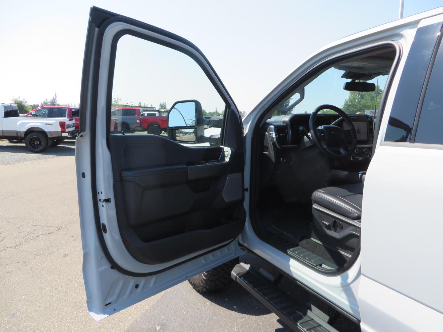 2025 Gray /Black Ford F-350 SD Lariat Crew Cab Short Bed 4WD (1FT8W3BM5SE) with an 6.7L V8 OHV 16V DIESEL engine, 6A transmission, located at 2630 Grass Valley Highway, Auburn, CA, 95603, (530) 508-5100, 38.937893, -121.095482 - Features a Readylift level kit, Falcon shocks, 20" Fuel Triton wheels, and 37" Nitto Ridge Grappler tires. - Photo#20