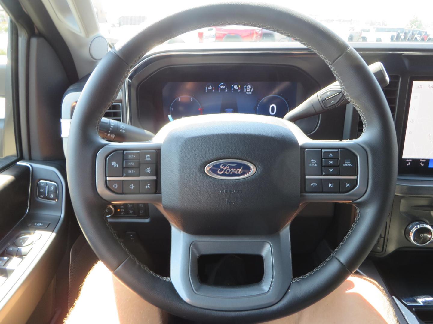 2025 Gray /Black Ford F-350 SD Lariat Crew Cab Short Bed 4WD (1FT8W3BM5SE) with an 6.7L V8 OHV 16V DIESEL engine, 6A transmission, located at 2630 Grass Valley Highway, Auburn, CA, 95603, (530) 508-5100, 38.937893, -121.095482 - Features a Readylift level kit, Falcon shocks, 20" Fuel Triton wheels, and 37" Nitto Ridge Grappler tires. - Photo#44