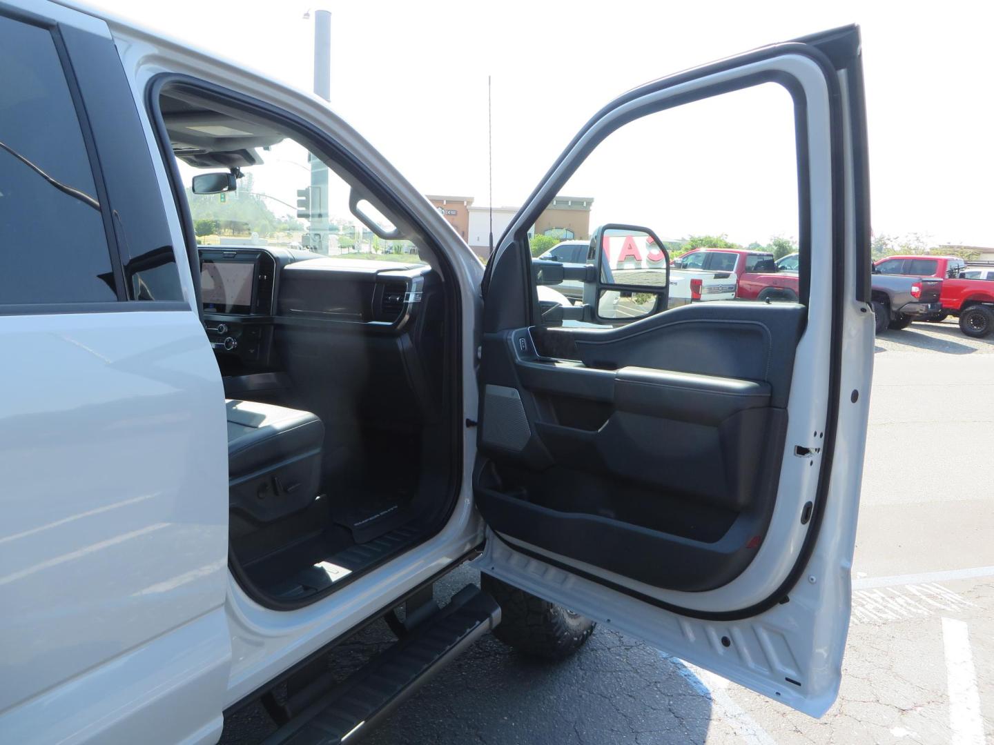 2025 Gray /Black Ford F-350 SD Lariat Crew Cab Short Bed 4WD (1FT8W3BM5SE) with an 6.7L V8 OHV 16V DIESEL engine, 6A transmission, located at 2630 Grass Valley Highway, Auburn, CA, 95603, (530) 508-5100, 38.937893, -121.095482 - Features a Readylift level kit, Falcon shocks, 20" Fuel Triton wheels, and 37" Nitto Ridge Grappler tires. - Photo#57