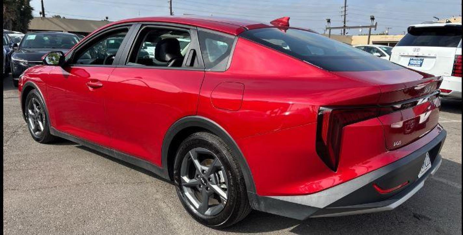 2025 RED Kia K4 (3KPFT4DE3SE) with an 4-Cyl 2.0 Liter engine, Automatic IVT transmission, located at 412 Auto Vista Drive, Palmdale, 93551, (661) 945-0620, 34.592636, -118.136681 - Photo#6