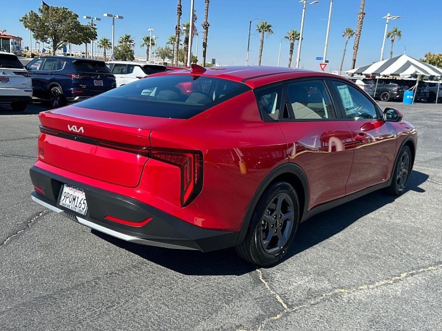 2025 RED Kia K4 (3KPFT4DE8SE) with an 4-Cyl 2.0 Liter engine, Automatic IVT transmission, located at 412 Auto Vista Drive, Palmdale, 93551, (661) 945-0620, 34.592636, -118.136681- Photo#4