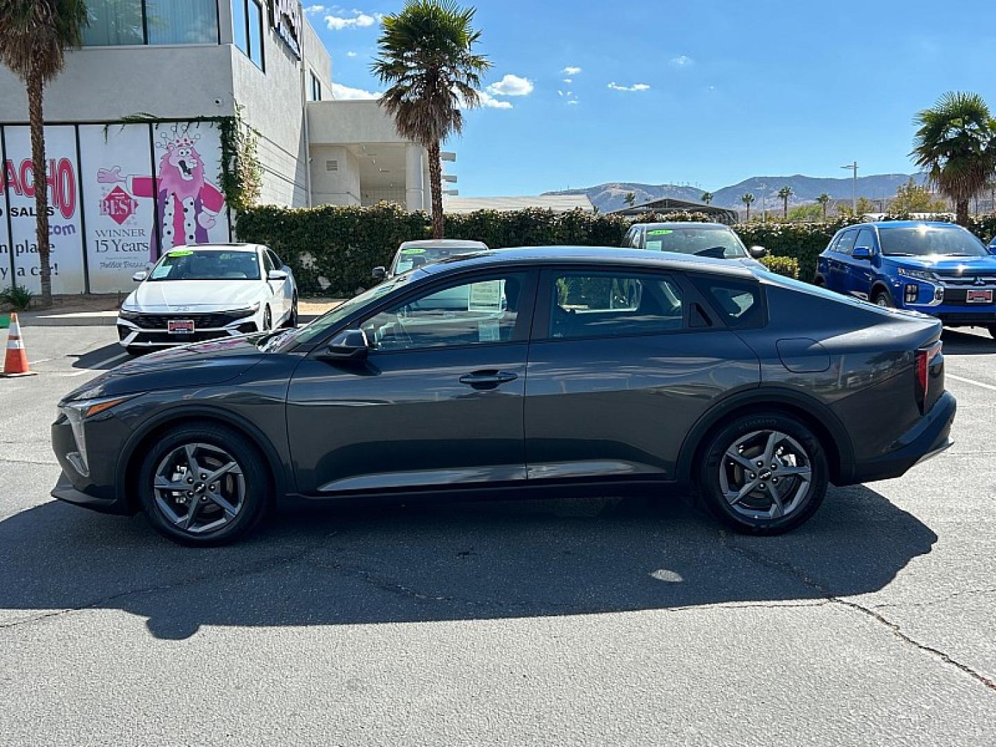2025 GRAY /black Kia K4 (3KPFT4DEXSE) with an 4-Cyl 2.0 Liter engine, Automatic IVT transmission, located at 412 Auto Vista Drive, Palmdale, 93551, (661) 945-0620, 34.592636, -118.136681 - Stand out with modern style and smart technology in this 2025 Kia K4 LXS!Featuring a sophisticated Interstellar Gray exterior and a sleek Medium Gray interior, this sedan is designed to make every drive comfortable and enjoyable. Powered by a 2.0L 4-cylinder engine paired with an Intelligent Variabl- Photo#3
