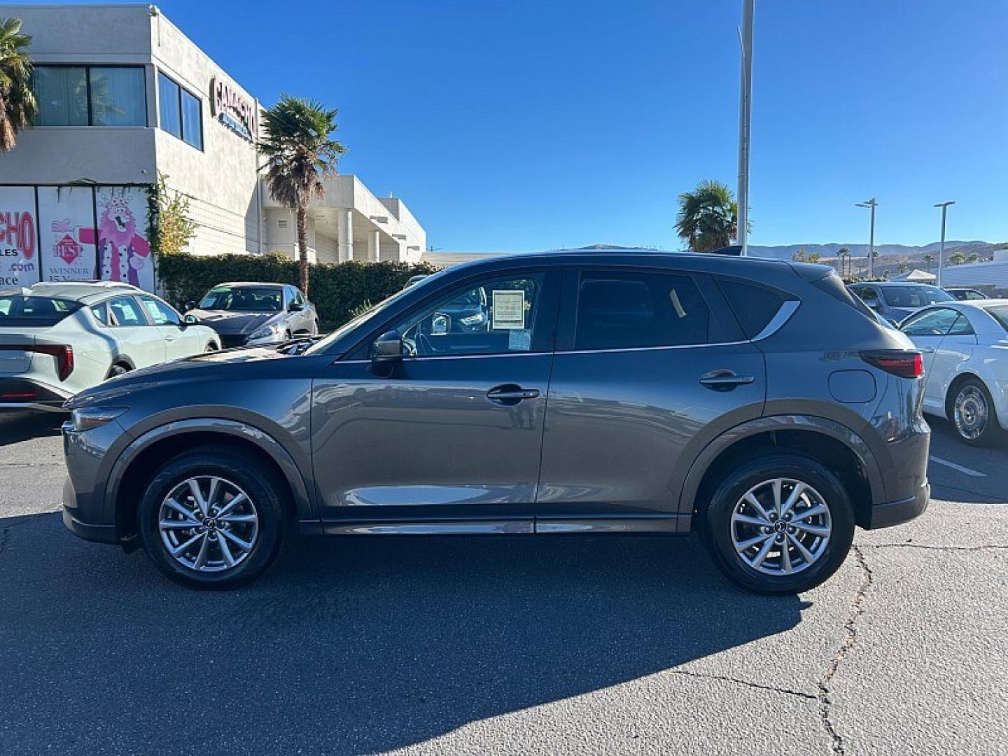2025 GRAY Mazda CX-5 (JM3KFBCLXS0) with an 4-Cyl 2.5 Liter engine, Automatic 6-Spd transmission, located at 412 Auto Vista Drive, Palmdale, 93551, (661) 945-0620, 34.592636, -118.136681- Photo#3