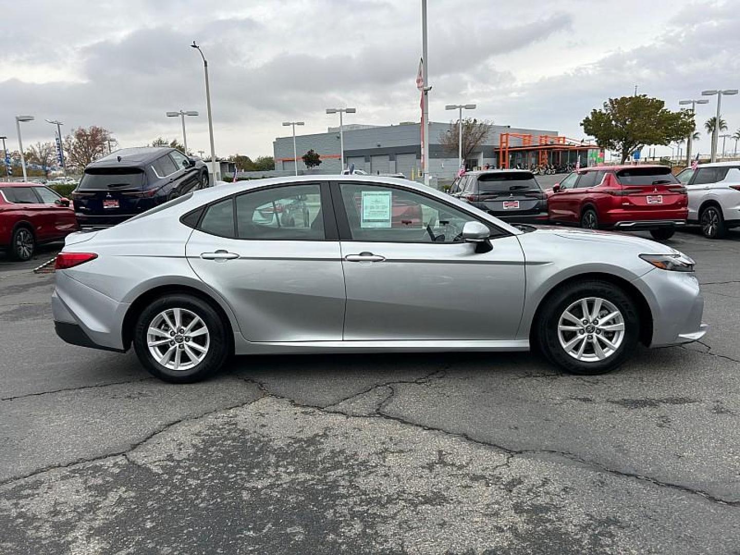 2025 SILVER Toyota Camry (4T1DAACK4SU) with an 4-Cyl Hybrid 2.5 Liter engine, Automatic CVT transmission, located at 412 Auto Vista Drive, Palmdale, 93551, (661) 945-0620, 34.592636, -118.136681- Photo#7