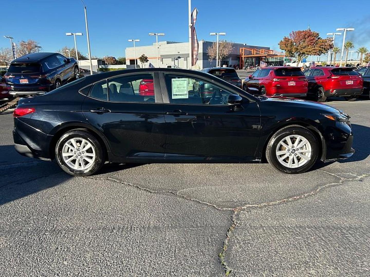 2025 BLACK Toyota Camry (4T1DAACK7SU) with an 4-Cyl Hybrid 2.5 Liter engine, Automatic CVT transmission, located at 412 Auto Vista Drive, Palmdale, 93551, (661) 945-0620, 34.592636, -118.136681 - Photo#8