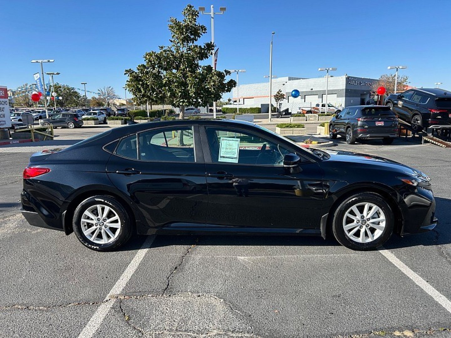 2025 Black Toyota Camry (4T1DAACK0SU) with an 4-Cyl Hybrid 2.5 Liter engine, Automatic CVT transmission, located at 412 Auto Vista Drive, Palmdale, 93551, (661) 945-0620, 34.592636, -118.136681- Photo#5