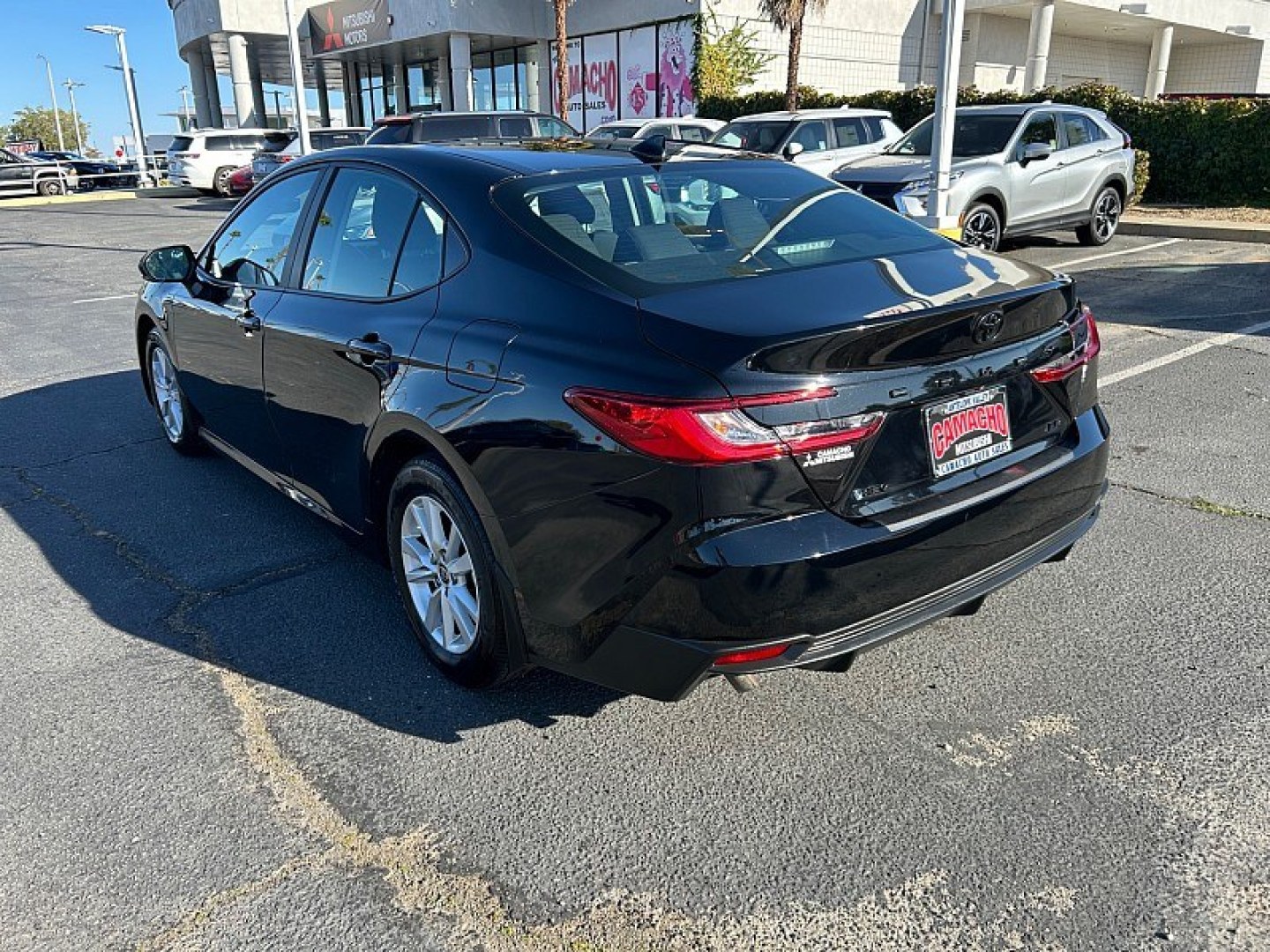 2025 Black Toyota Camry (4T1DAACK0SU) with an 4-Cyl Hybrid 2.5 Liter engine, Automatic CVT transmission, located at 412 Auto Vista Drive, Palmdale, 93551, (661) 945-0620, 34.592636, -118.136681- Photo#8