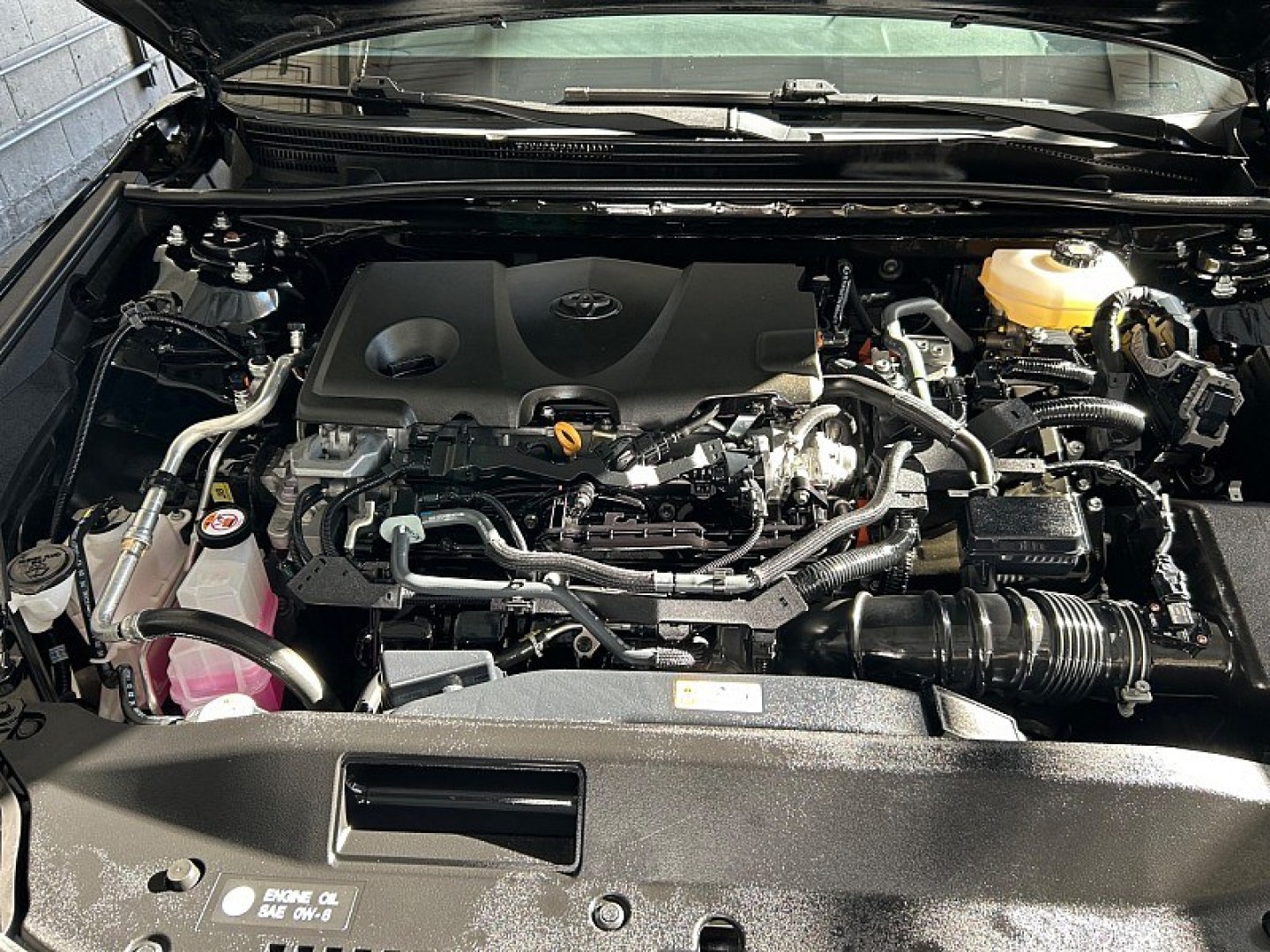 2025 Black Toyota Camry (4T1DAACK0SU) with an 4-Cyl Hybrid 2.5 Liter engine, Automatic CVT transmission, located at 412 Auto Vista Drive, Palmdale, 93551, (661) 945-0620, 34.592636, -118.136681- Photo#23