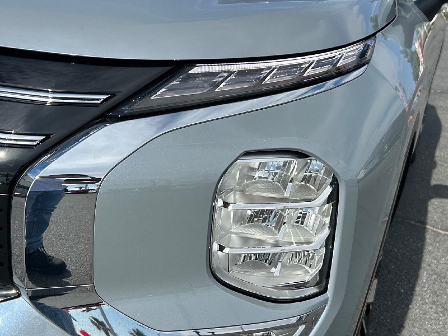 2026 Gray Mitsubishi Outlander (JA4J3VAB4TZ) with an 4-Cyl Turbo Hybrid 1.5 Liter engine, Automatic CVT transmission, located at 412 Auto Vista Drive, Palmdale, 93551, (661) 945-0620, 34.592636, -118.136681- Photo#13