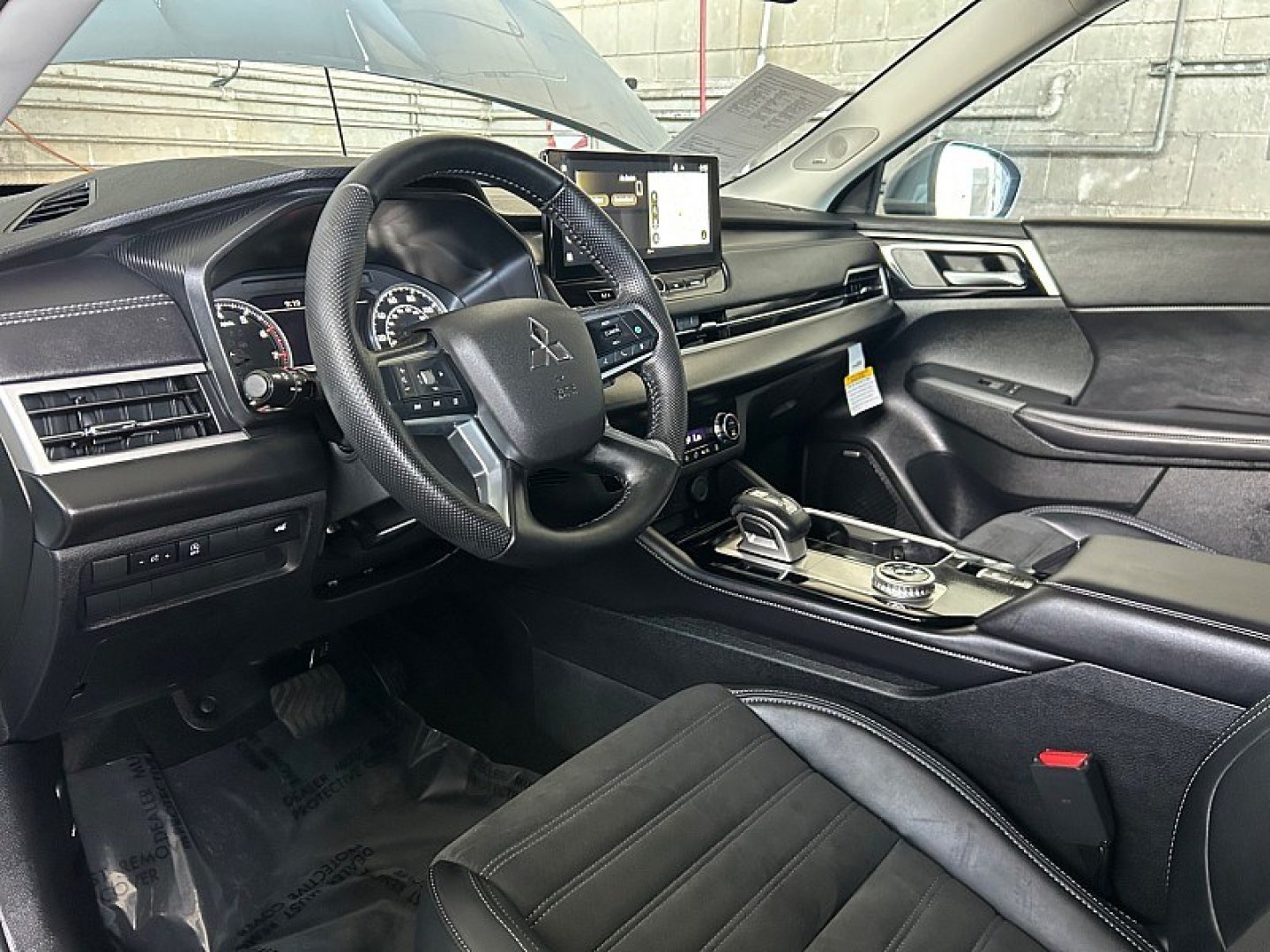 2026 Gray Mitsubishi Outlander (JA4J3VAB4TZ) with an 4-Cyl Turbo Hybrid 1.5 Liter engine, Automatic CVT transmission, located at 412 Auto Vista Drive, Palmdale, 93551, (661) 945-0620, 34.592636, -118.136681- Photo#17