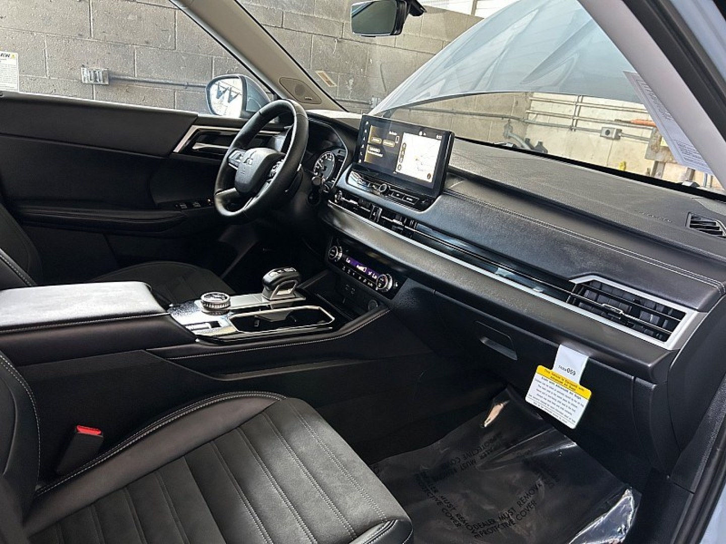 2026 Gray Mitsubishi Outlander (JA4J3VAB4TZ) with an 4-Cyl Turbo Hybrid 1.5 Liter engine, Automatic CVT transmission, located at 412 Auto Vista Drive, Palmdale, 93551, (661) 945-0620, 34.592636, -118.136681- Photo#28